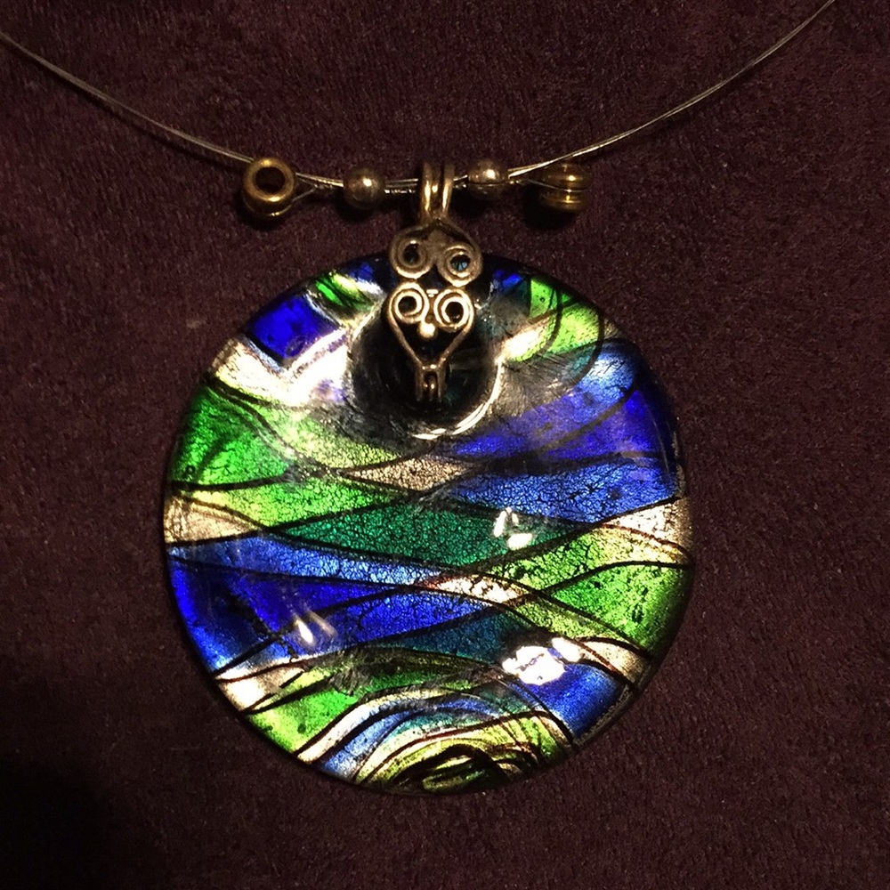 Glass pendant on guitar string necklace